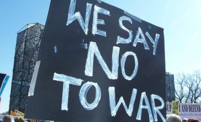 Large_we-say-no-to-war-sign-seen-at-a-2007-anti-war-protest.-photo-by-thiago-santos-on-flickr-e1534638830519